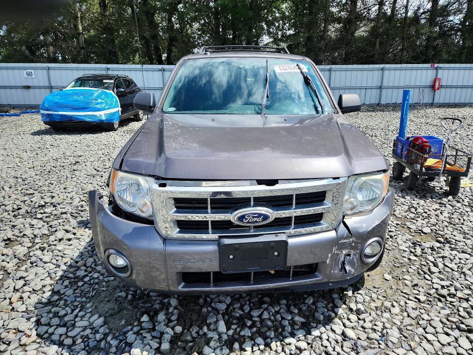 Foto 5 de la subasta – 2011 FORD ESCAPE con VIN 1FMCU0D73BKC39649