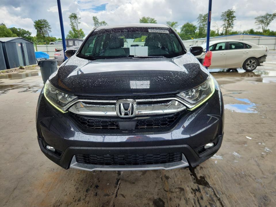 Photo 5 from auction – 2019 HONDA CR-V with VIN 5J6RW1H86KA019665