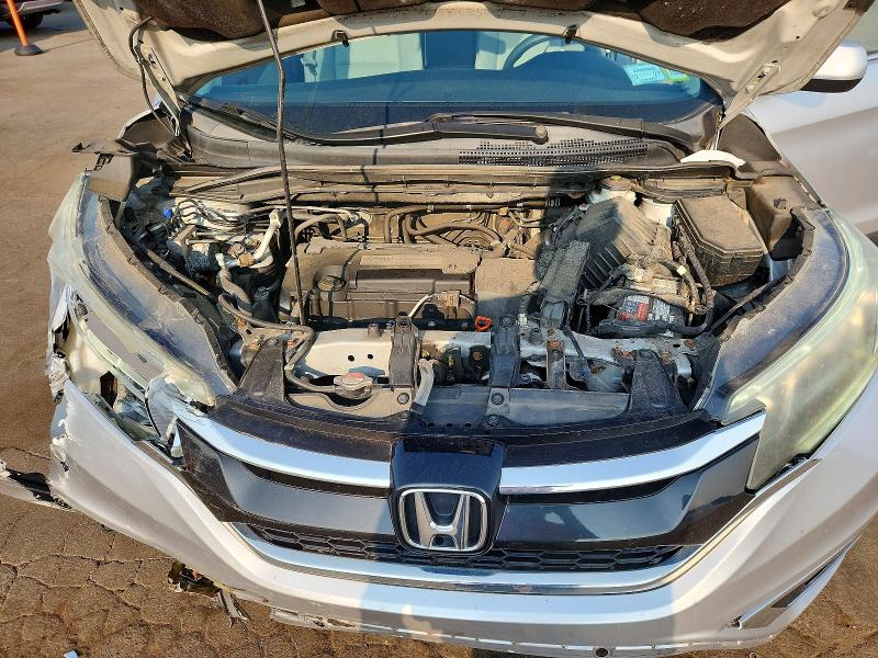 Photo 12 from auction – 2015 HONDA CR-V with VIN 2HKRM4H52FH660913