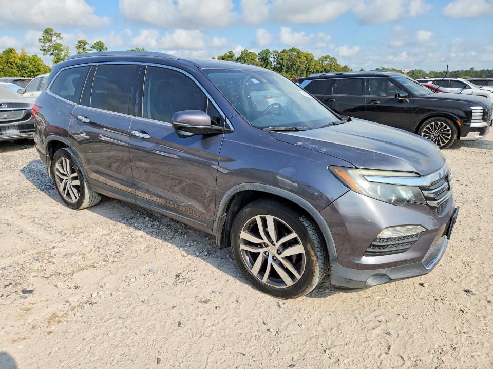 Photo 4 from auction – 2016 HONDA PILOT with VIN 5FNYF5H92GB040741