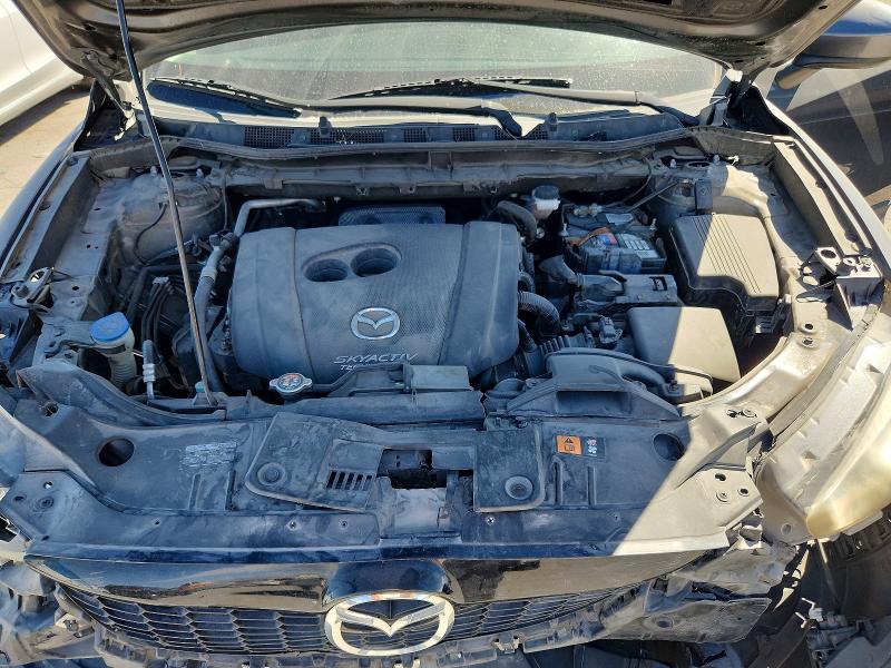 Photo 12 from auction – 2015 MAZDA CX-5 with VIN JM3KE2CY2F0435710