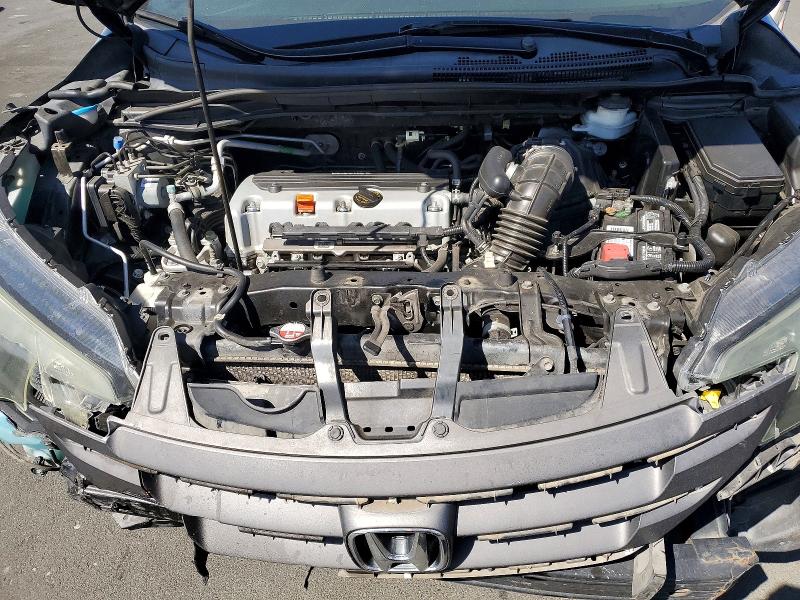 Photo 11 from auction – 2014 HONDA CR-V with VIN 2HKRM4H38EH620803