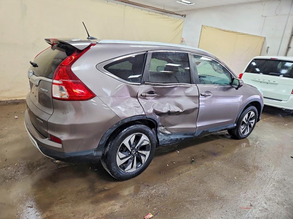 Photo 3 from auction – 2015 HONDA CR-V with VIN 5J6RM4H93FL061589