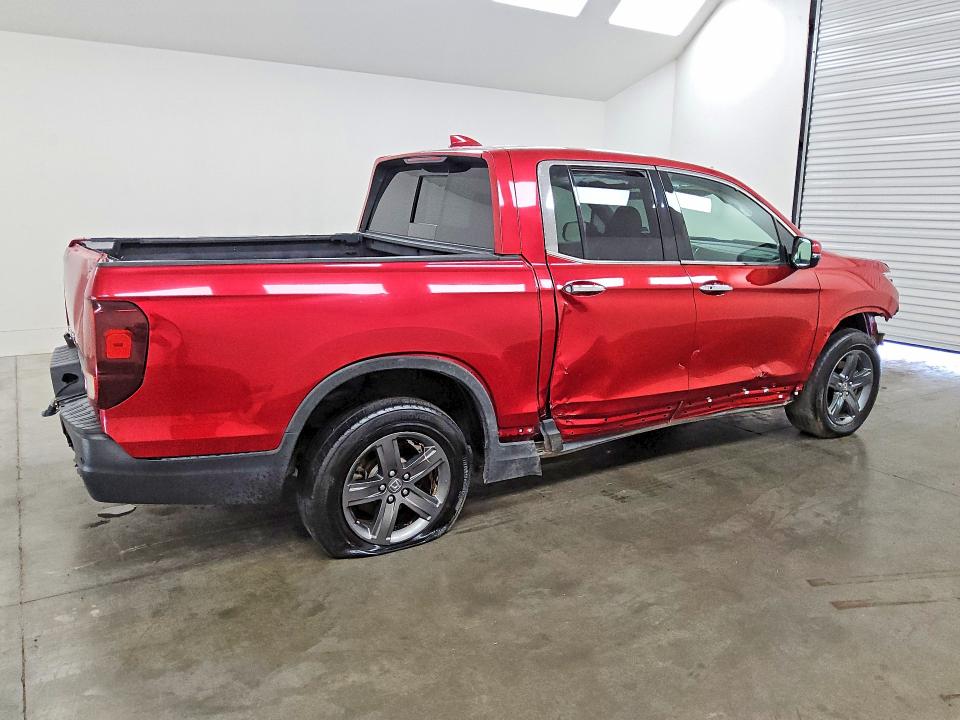 Photo 3 from auction – 2023 HONDA RIDGELINE with VIN 5FPYK3F79PB007597
