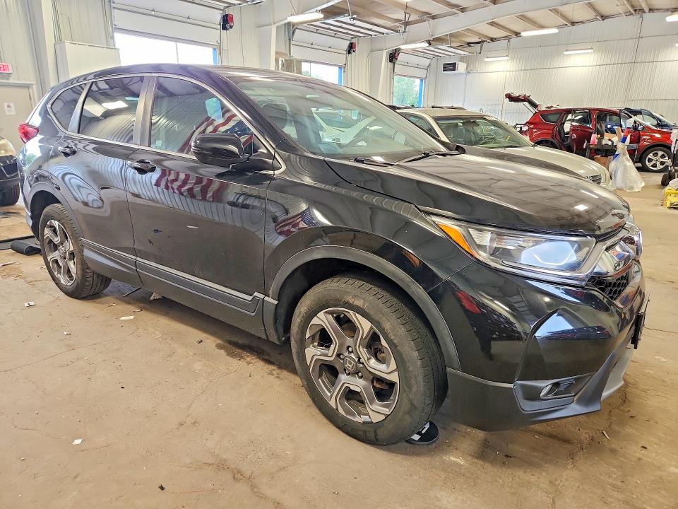 Photo 4 from auction – 2019 HONDA CR-V with VIN 5J6RW2H53KL033443