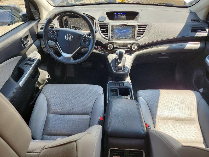 Photo 8 from auction – 2015 HONDA CR-V with VIN 2HKRM4H77FH608307