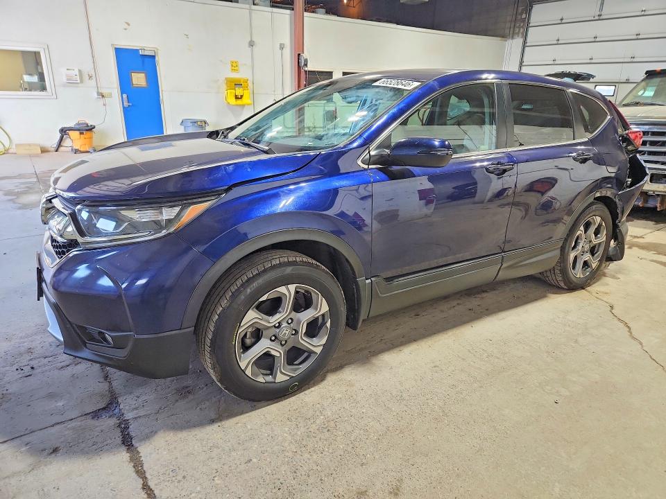 Photo 1 from auction – 2018 HONDA CR-V with VIN 7FARW2H8XJE080006