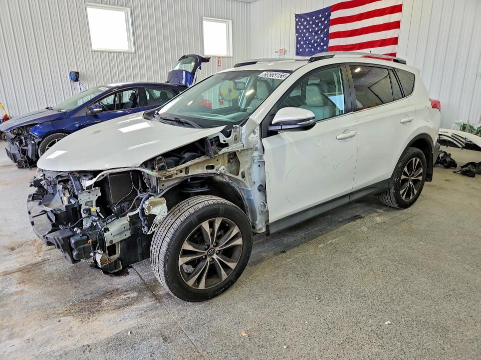 TOYOTA RAV4 2015 с VIN 2T3DFREV7FW348228 - Фото с аукциона