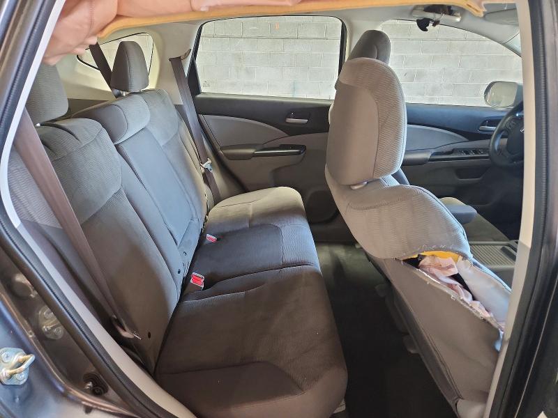 Photo 11 from auction – 2014 HONDA CR-V with VIN 2HKRM4H30EH686374