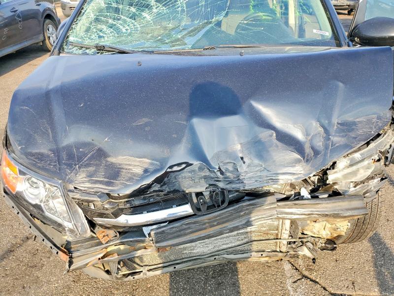Photo 12 from auction – 2014 HONDA ODYSSEY with VIN 5FNRL5H44EB127376
