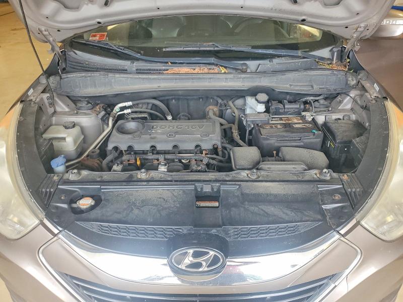 Photo 12 from auction – 2010 HYUNDAI TUCSON with VIN KM8JUCAC1AU047207