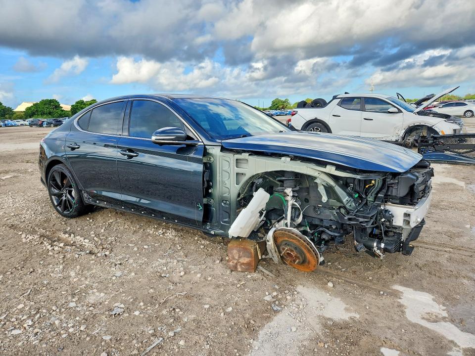 Photo 4 from auction – 2023 GENESIS G70 with VIN KMTG54TEXPU117524