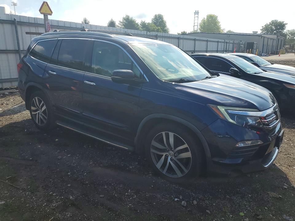Photo 4 from auction – 2016 HONDA PILOT with VIN 5FNYF6H07GB021934
