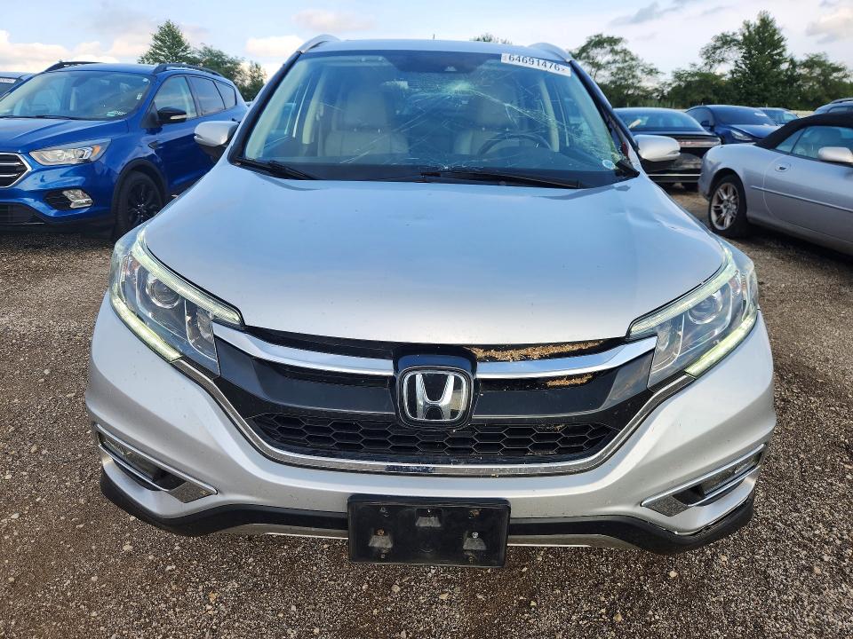 Photo 5 from auction – 2016 HONDA CR-V with VIN 5J6RM4H90GL101032