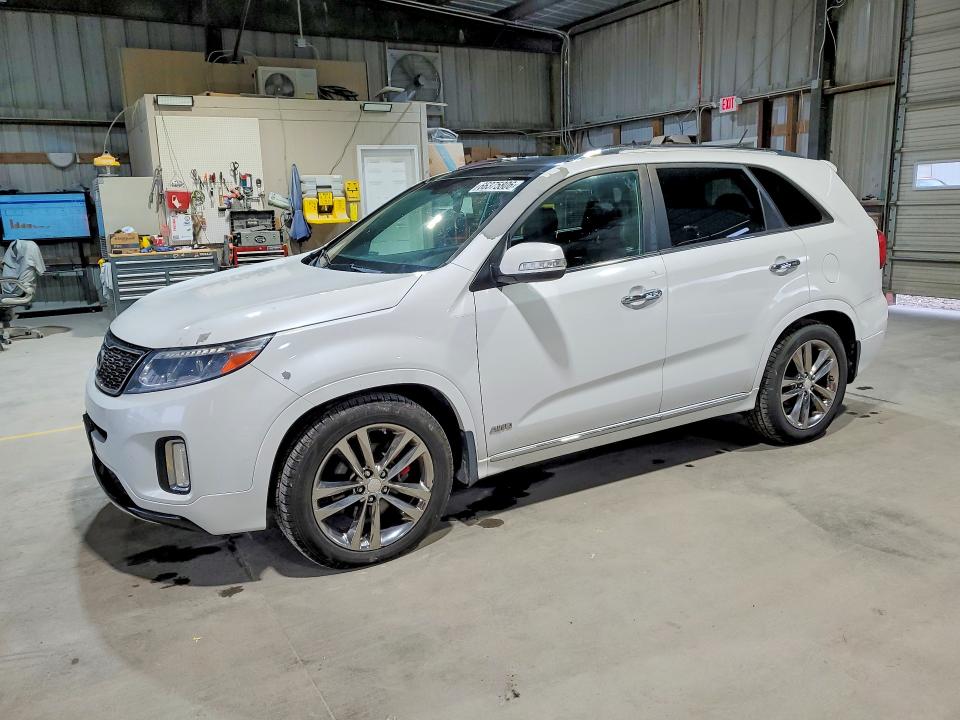 KIA SORENTO 2015 with VIN 5XYKWDA74FG581063 - Photo from auction
