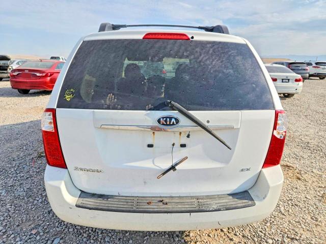 Photo 6 from auction – 2006 KIA SEDONA with VIN KNDMB233766069559