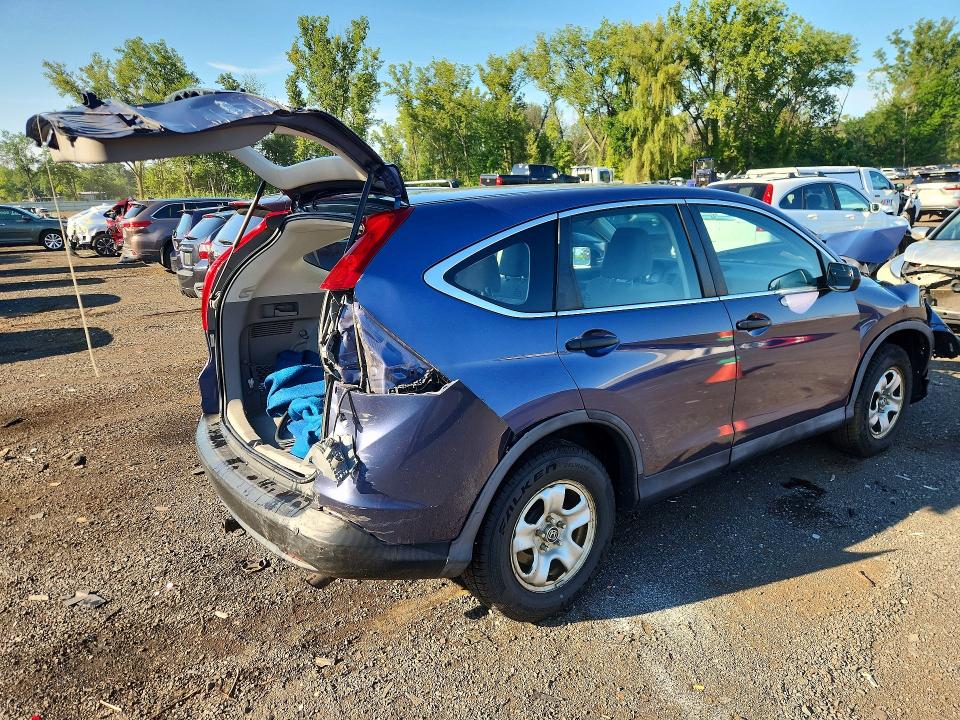 Photo 3 from auction – 2014 HONDA CR-V with VIN 2HKRM4H38EH642851
