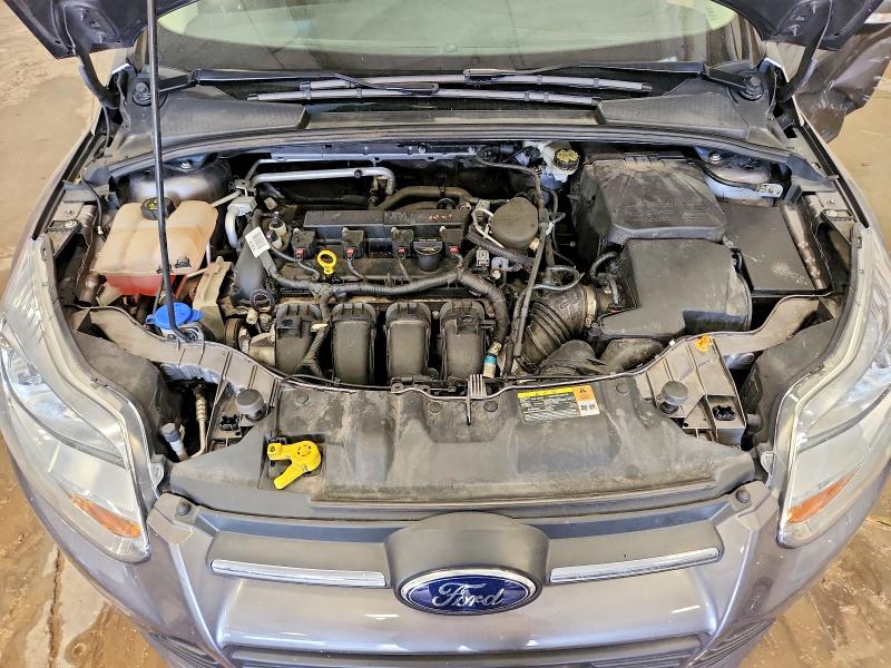 Photo 11 from auction – 2014 FORD FOCUS with VIN 1FADP3F29EL194675