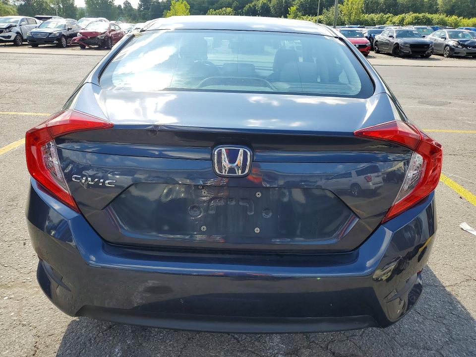 Photo 6 from auction – 2018 HONDA CIVIC with VIN 2HGFC2F51JH560415