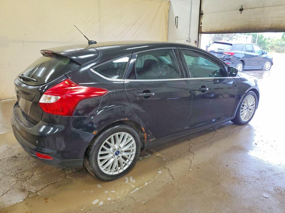 Photo 3 from auction – 2013 FORD FOCUS with VIN 1FADP3N24DL304015