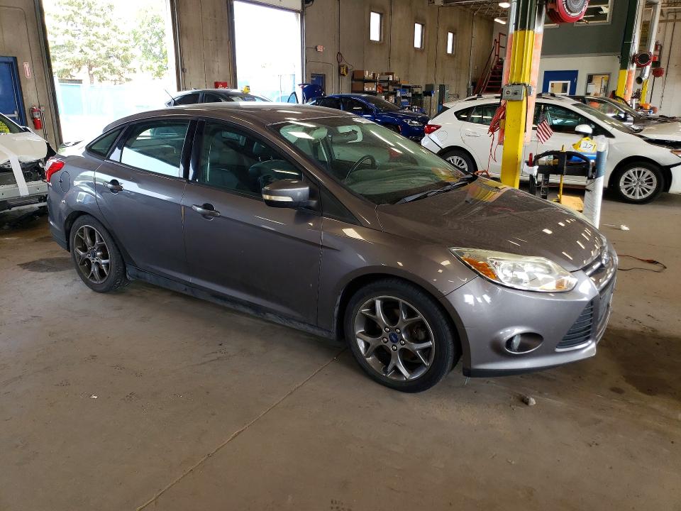 Photo 4 from auction – 2014 FORD FOCUS with VIN 1FADP3F23EL209607