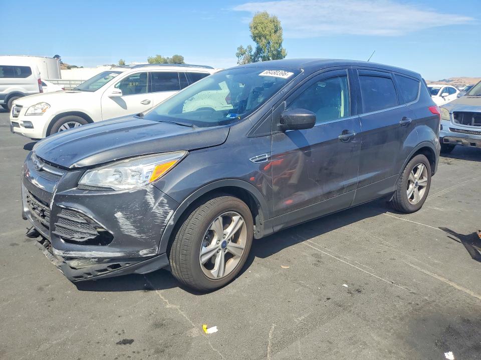 FORD ESCAPE 2015 with VIN 1FMCU9GX4FUC10011 - Photo from auction