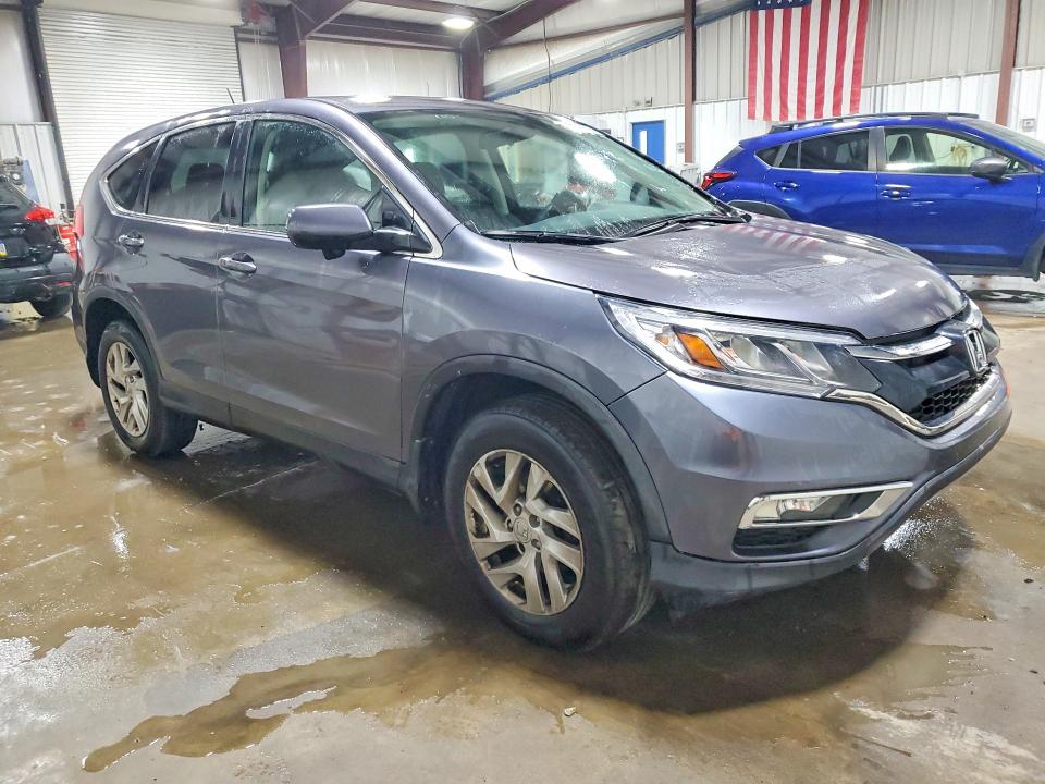 Photo 4 from auction – 2015 HONDA CR-V with VIN 2HKRM4H52FH611727
