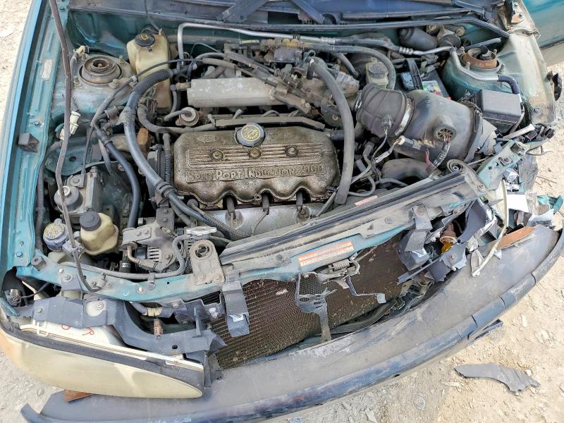 Photo 11 from auction – 1997 FORD ESCORT with VIN 3FALP15P0VR129048