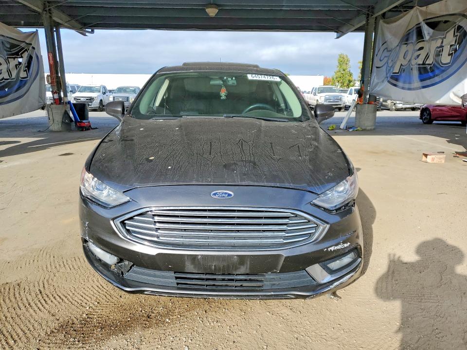 Photo 5 from auction – 2018 FORD FUSION with VIN 3FA6P0LU1JR128517