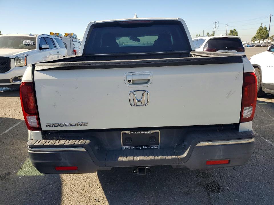 Photo 6 from auction – 2018 HONDA RIDGELINE with VIN 5FPYK2F69JB000612