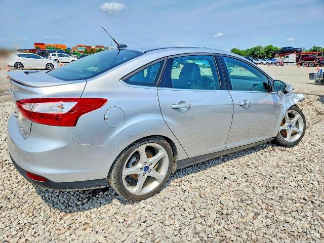 Photo 3 from auction – 2014 FORD FOCUS with VIN 1FADP3J29EL143040