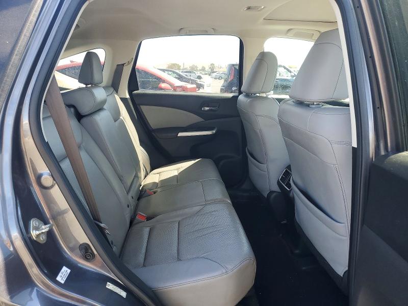 Photo 11 from auction – 2015 HONDA CR-V with VIN 2HKRM3H77FH503292