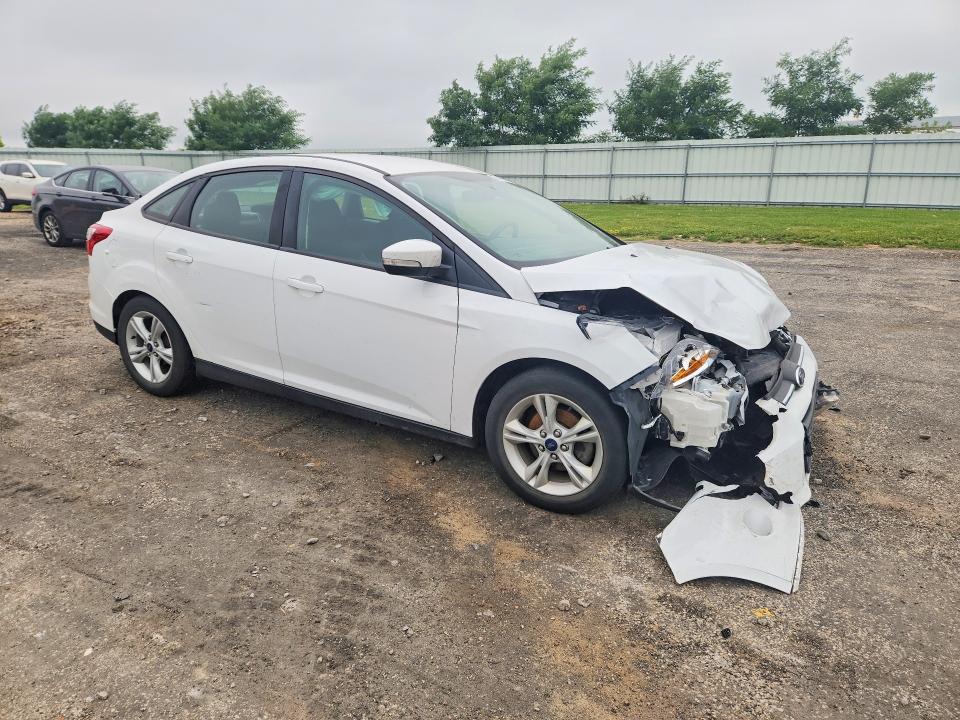 Photo 4 from auction – 2014 FORD FOCUS with VIN 1FADP3F20EL411112