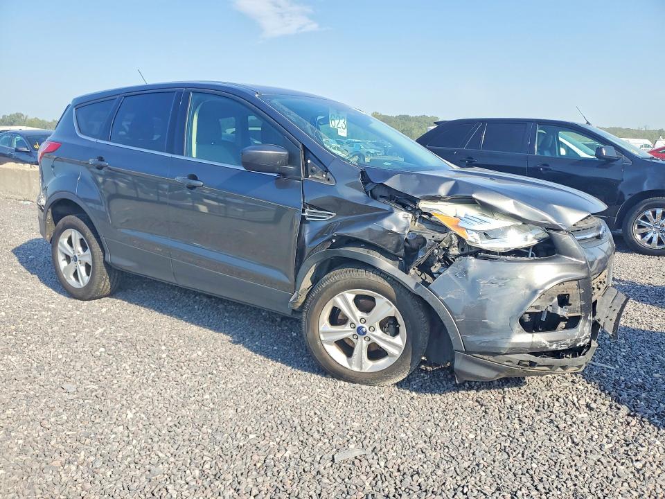Photo 4 from auction – 2015 FORD ESCAPE with VIN 1FMCU0GX5FUC34720