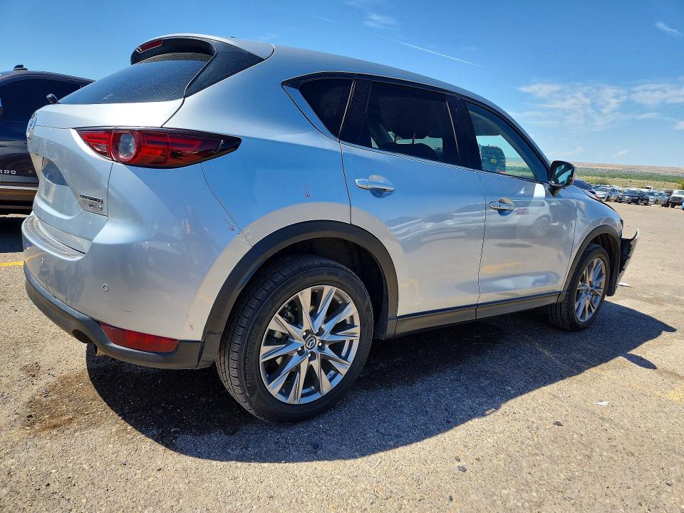 Photo 3 from auction – 2021 MAZDA CX-5 with VIN JM3KFBAY8M0413255