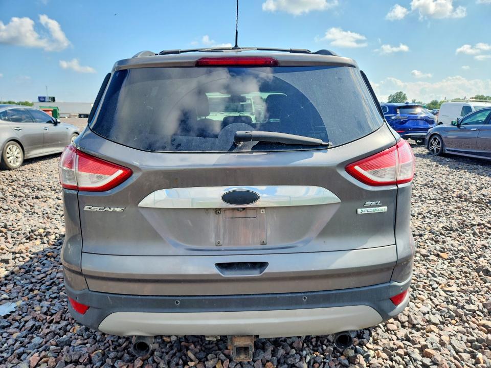 Photo 6 from auction – 2013 FORD ESCAPE with VIN 1FMCU0H90DUD00877