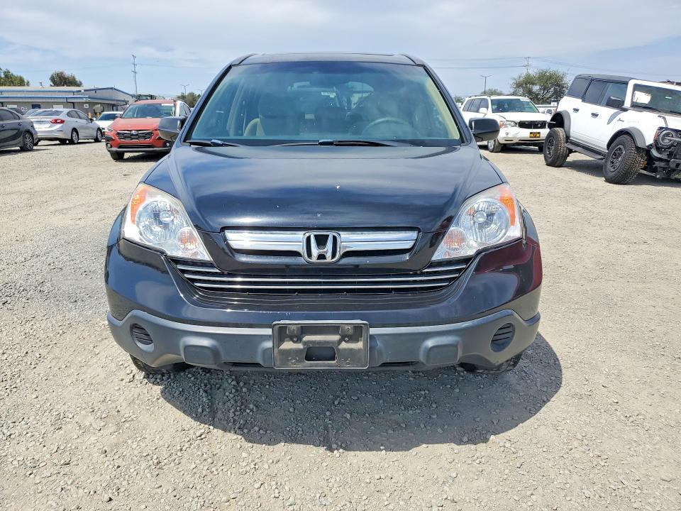 Photo 5 from auction – 2009 HONDA CR-V with VIN 5J6RE38579L033416