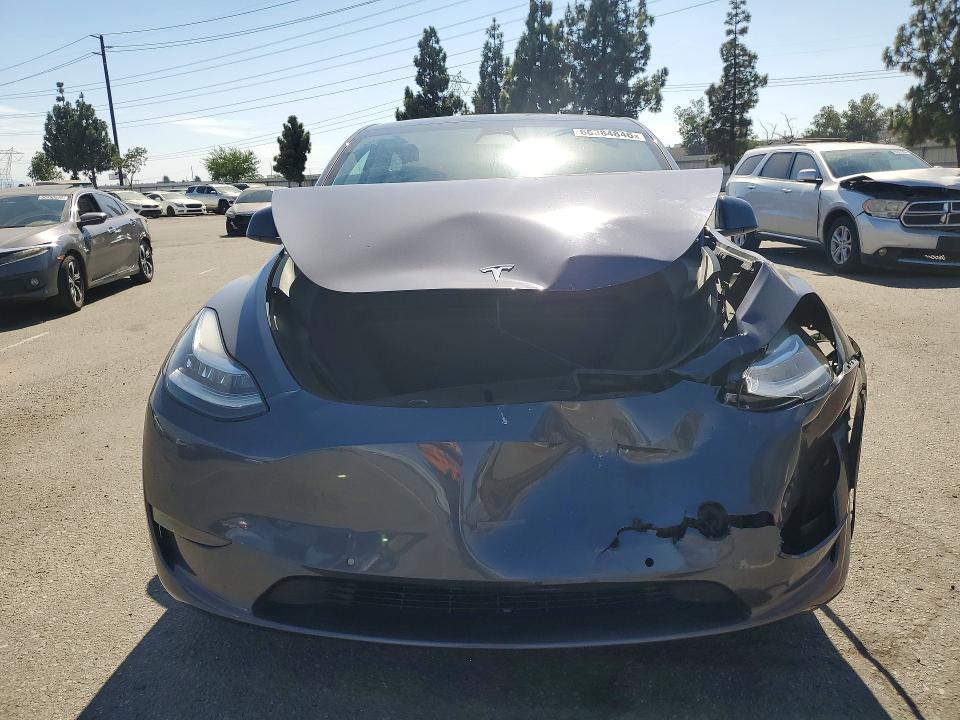 Photo 5 from auction – 2022 TESLA MODEL Y with VIN 7SAYGAEE6NF574137