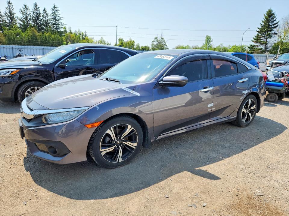 HONDA CIVIC 2017 with VIN 2HGFC1F95HH100570 - Photo from auction