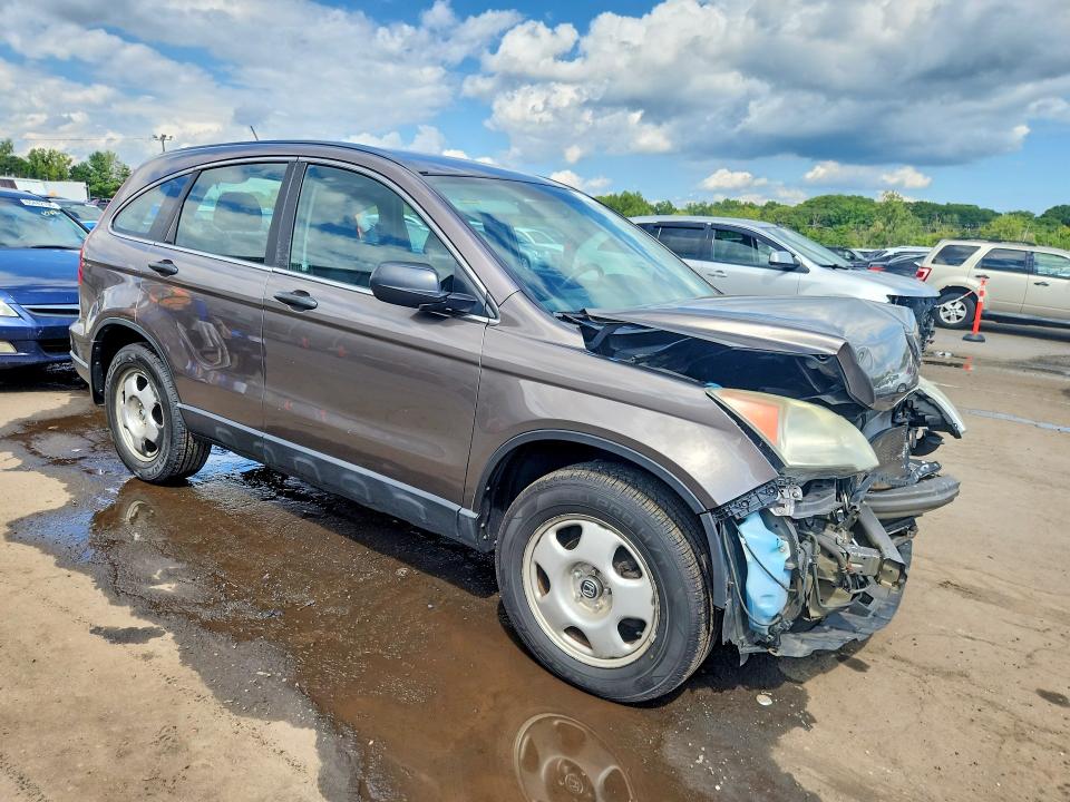 Photo 4 from auction – 2011 HONDA CR-V with VIN 5J6RE4H35BL083189