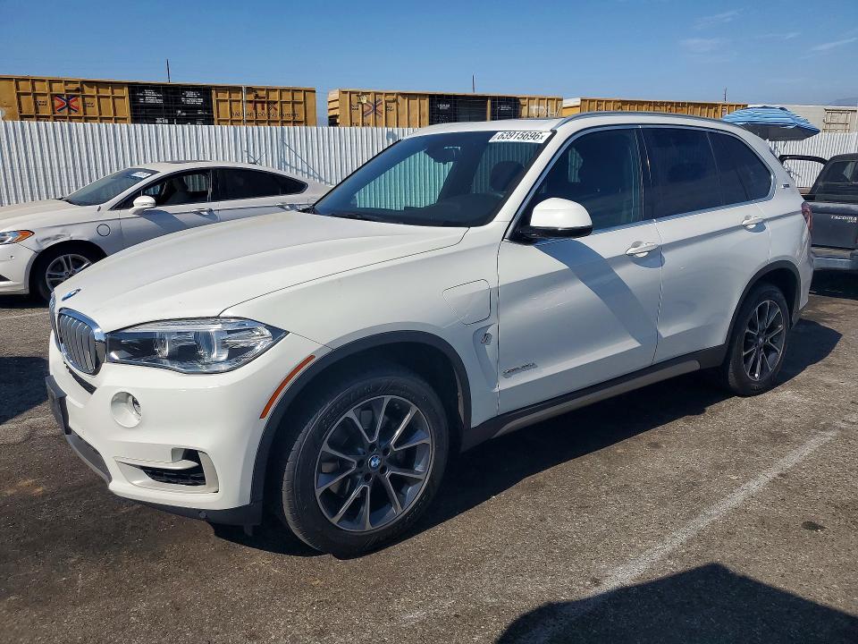 BMW X5 2018 with VIN 5UXKT0C50J0W00573 - Photo from auction
