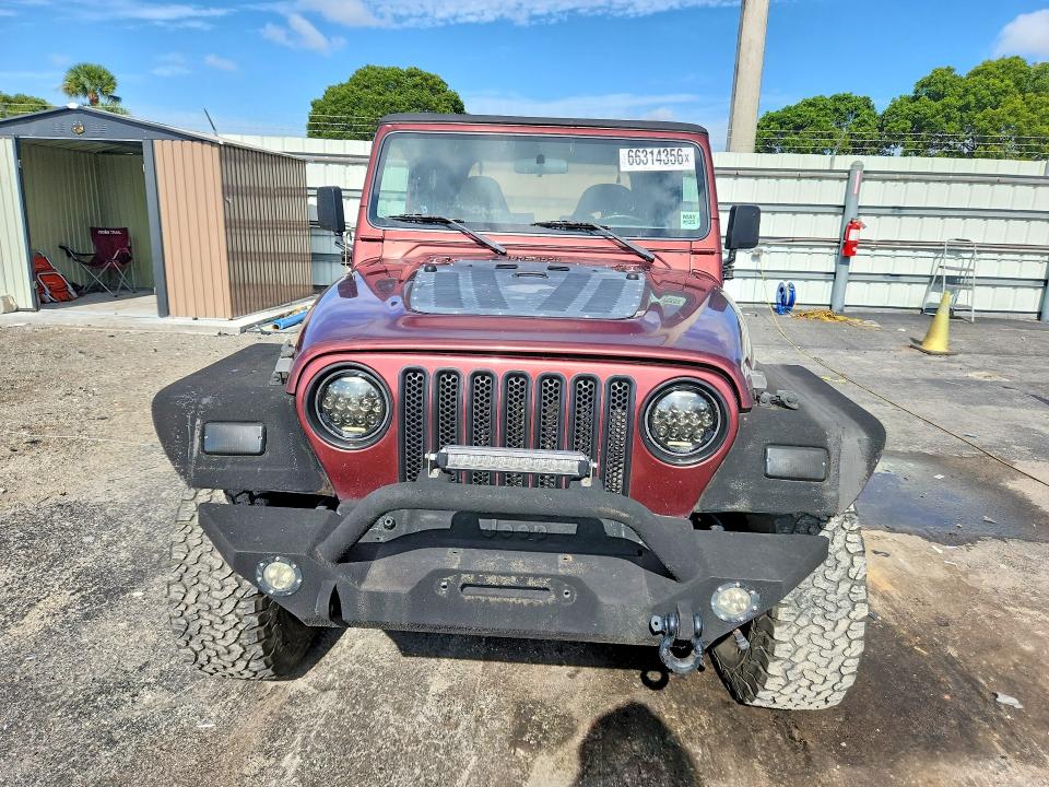Photo 5 from auction – 2002 JEEP WRANGLER / TJ with VIN 1J4FA49S72P710102
