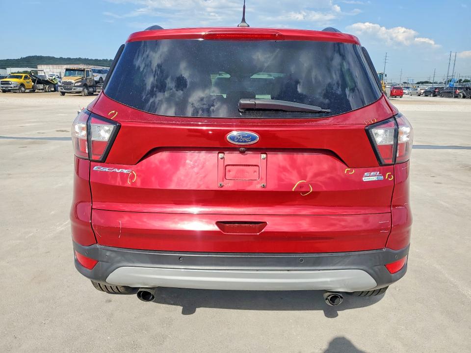 Photo 6 from auction – 2018 FORD ESCAPE with VIN 1FMCU9HD3JUA54606