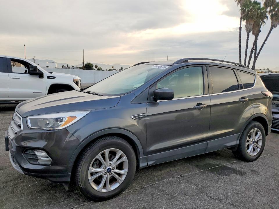 FORD ESCAPE 2018 with VIN 1FMCU0GDXJUD21964 - Photo from auction