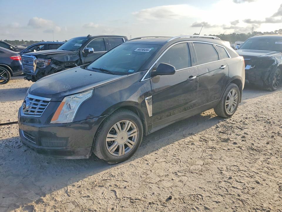 CADILLAC SRX 2014 with VIN 3GYFNBE3XES645839 - Photo from auction