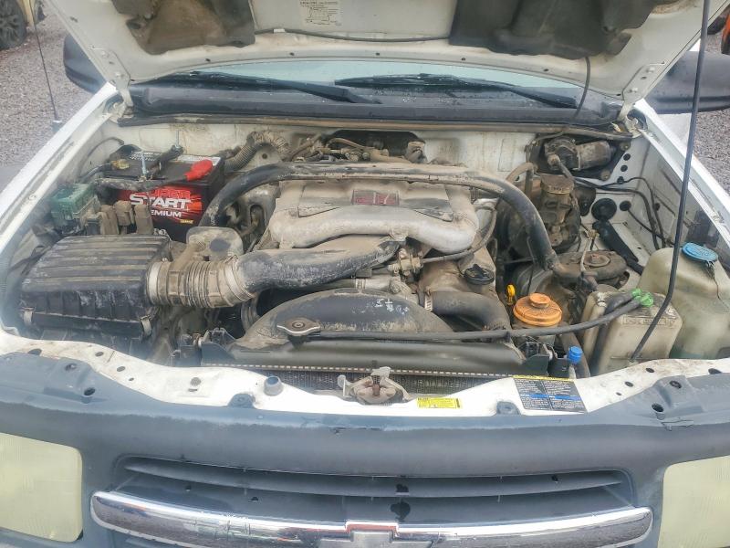 Photo 12 from auction – 2004 CHEVROLET TRACKER with VIN 2CNBJ734446911910