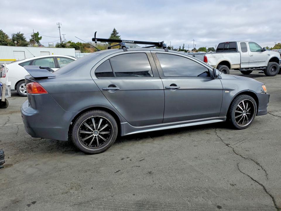 Photo 3 from auction – 2009 MITSUBISHI LANCER with VIN JA3AU86WX9U021543
