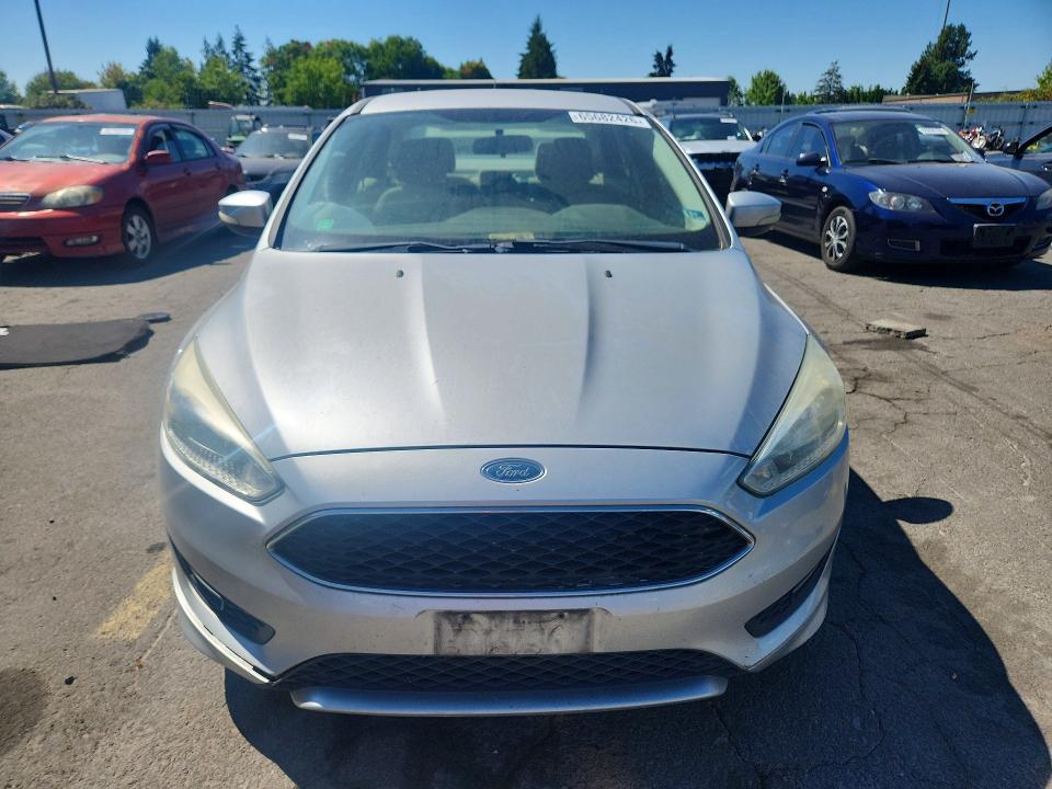 Photo 5 from auction – 2015 FORD FOCUS with VIN 1FADP3F20FL268017