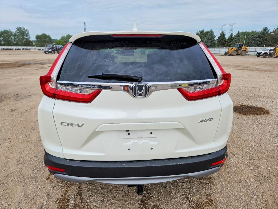 Photo 6 from auction – 2017 HONDA CR-V with VIN 2HKRW2H80HH656404