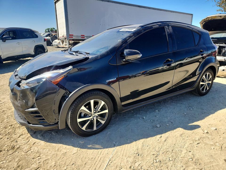 TOYOTA PRIUS C 2018 with VIN JTDKDTB37J1608115 - Photo from auction